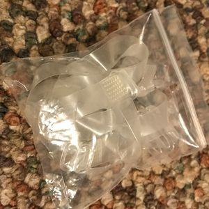 Clear Adjustable straps.